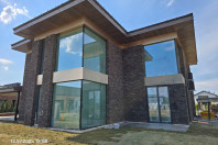 Строительство загородной виллы - отделка фасадов